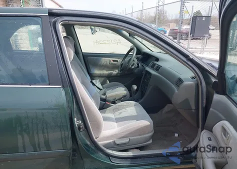 2000 Toyota Camry Le z USA, uszkodzony, nr VIN JT2BG22K9Y0399445